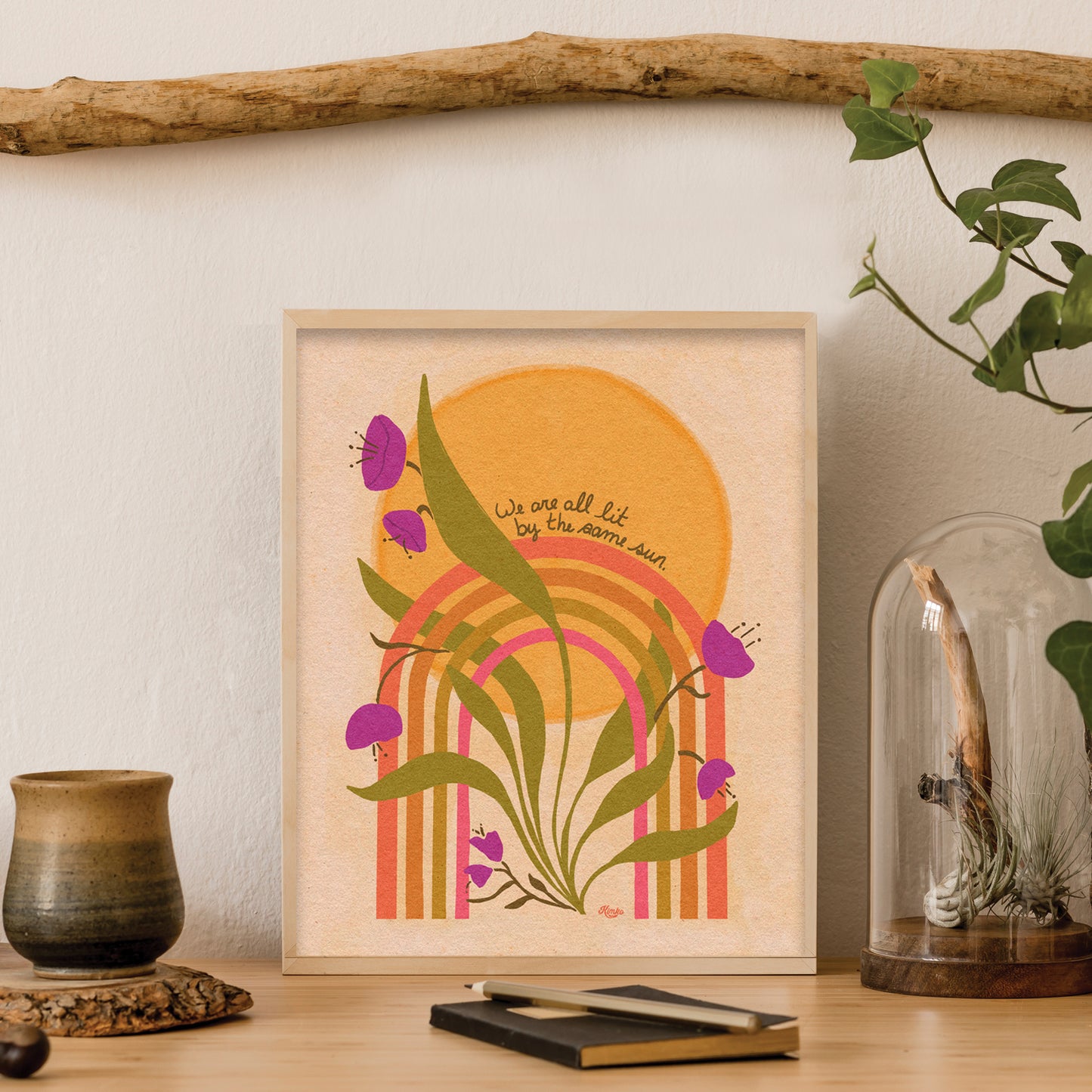 Rainbow Bloom | "We are all lit by the same sun."